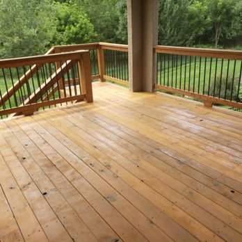Freshly stained and sealed backyard wood deck